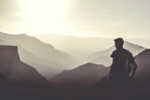 Entrepreneur considering company exit options - looking at the mountains